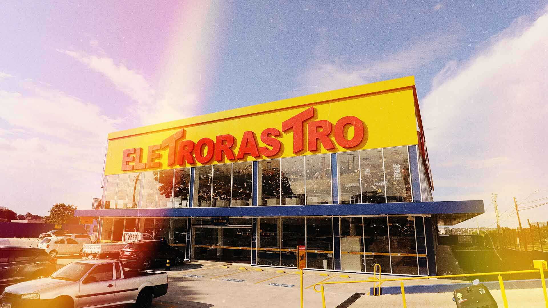 Foto frontal da Eletrorastro. Na parte superior do prédio uma fachada amarela com letreiro Eletrorastro em vermelho.